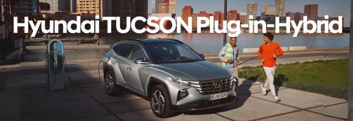 Hyundai TUCSON Plug-in-Hybrid an Ladestation am Ufer